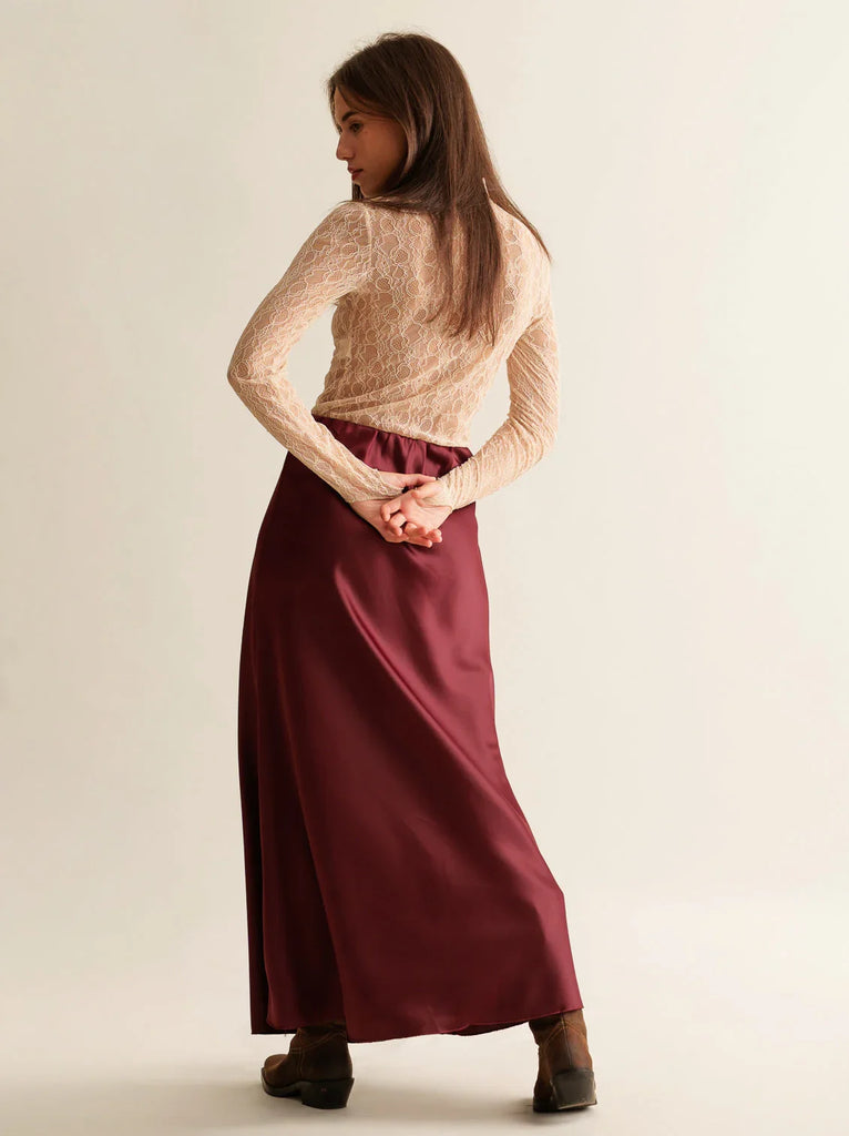 Keena Skirt — burgundy satin skirt on model — MYFASHIONFRUIT