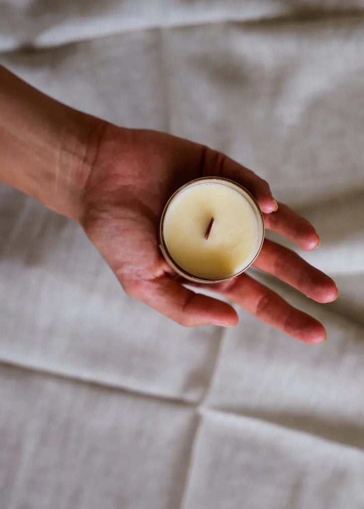 Massage Candle - Woman's hand holding candle — MYFASHIONFRUIT