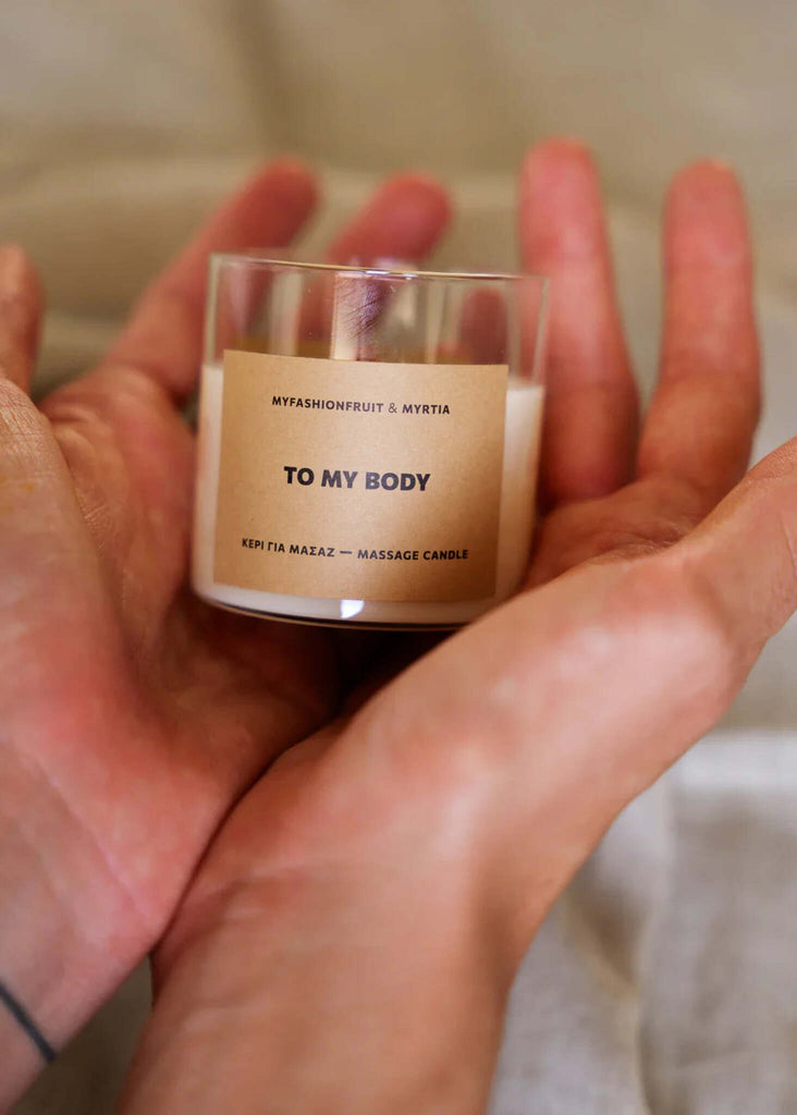 Massage Candle To My Body — candle in glass being held — MYFASHIONFRUIT