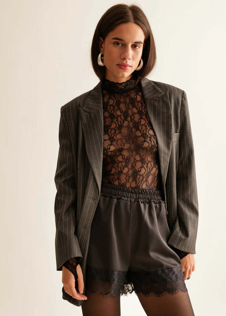 Marcia Shorts — Black satin shorts with lace, on model — MYFASHIONFRUIT