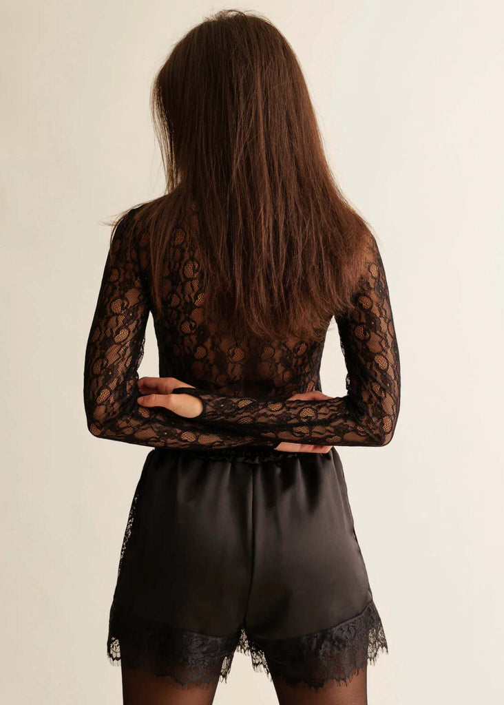Marcia Shorts — Black shorts with lace trim on model — MYFASHIONFRUIT