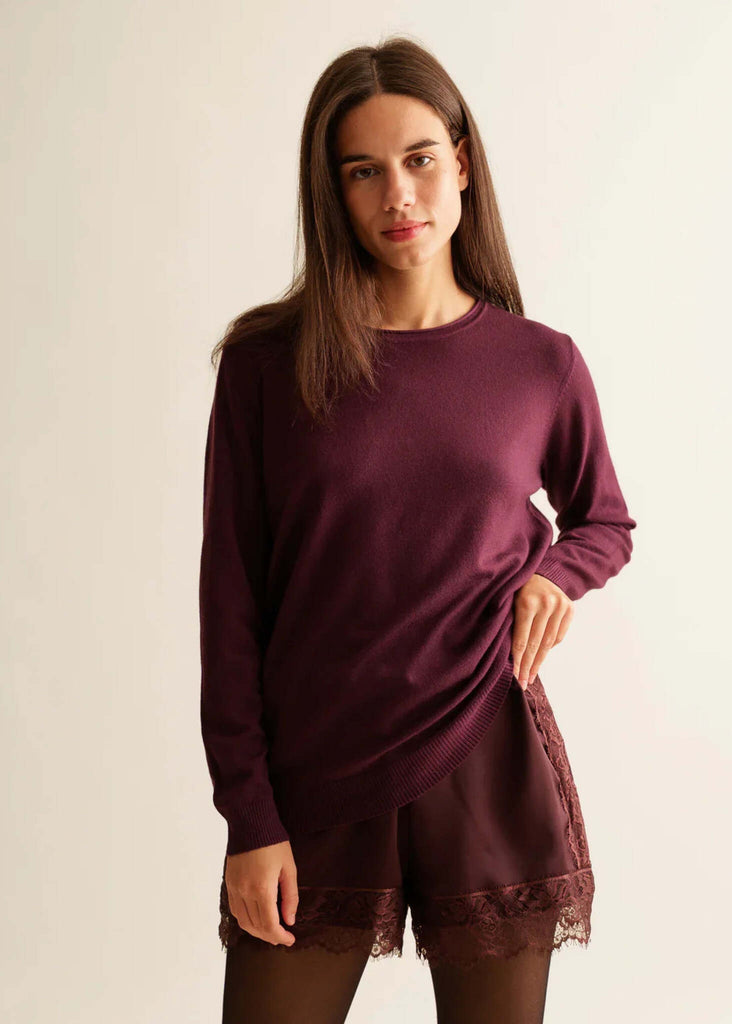 Marcia Shorts — Lace-trimmed satin shorts in burgundy, on model — MYFASHIONFRUIT