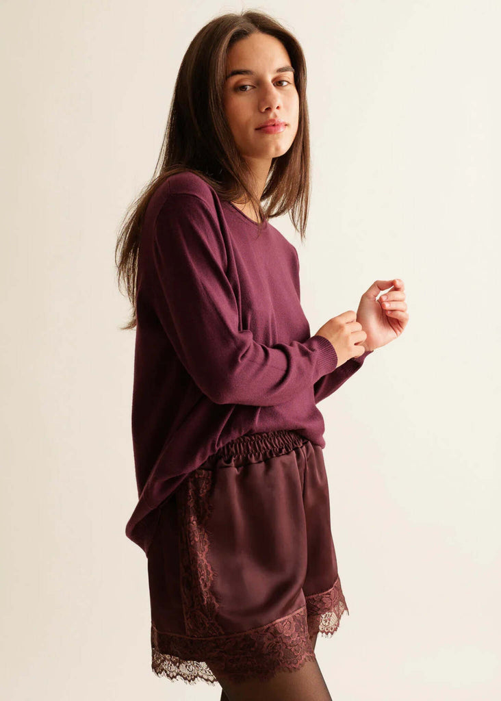Marcia Shorts — Burgundy satin shorts with lace, on model — MYFASHIONFRUIT