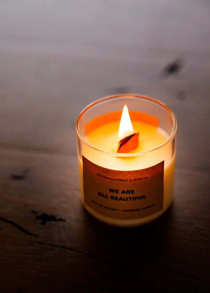 Massage Candle — lit candle in glass — MYFASHIONFRUIT