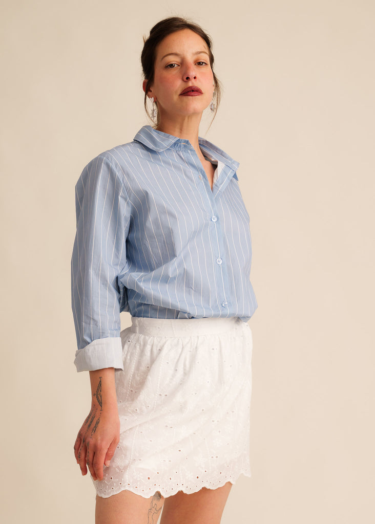 Ninon Skirt — White eyelet skirt on model, paired with blue striped shirt — MYFASHIONFRUIT
