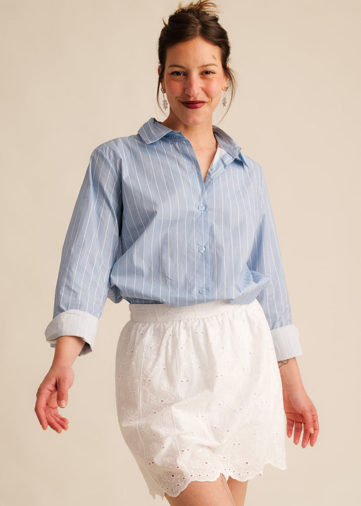 Ninon Skirt — White eyelet skirt on model, paired with blue striped shirt — MYFASHIONFRUIT