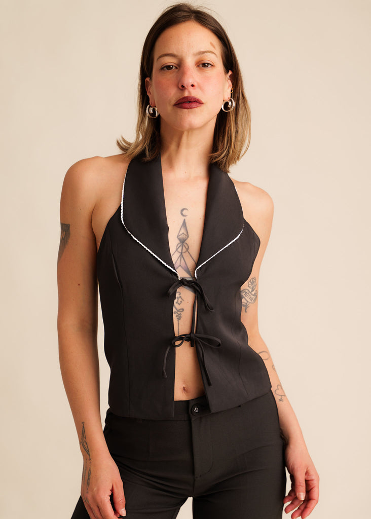 Cassiopée Waistcoat Top — Black halter neck top with white trim, on model — MYFASHIONFRUIT