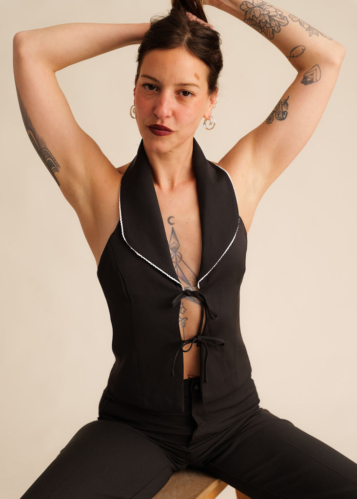 Cassiopée Waistcoat Top — Black waistcoat with white trim, on model — MYFASHIONFRUIT