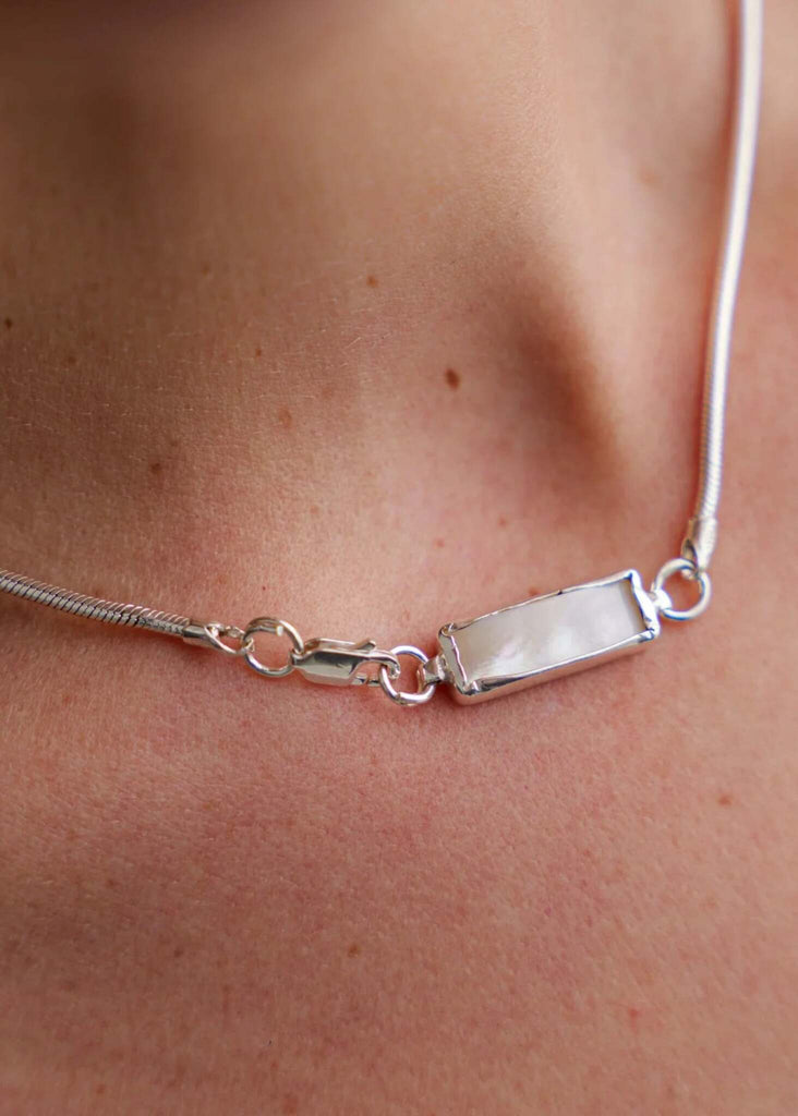 Eurydice Necklace — Silver chain, mother of pearl detail on model — MYFASHIONFRUIT