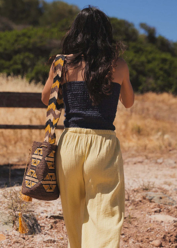 Koo Bucket Bag — Bag on model with yellow pants — MYFASHIONFRUIT