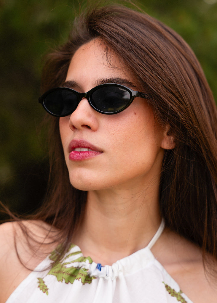 Komono DORIS Black Sunglasses — Black cat-eye sunglasses on model — MYFASHIONFRUIT