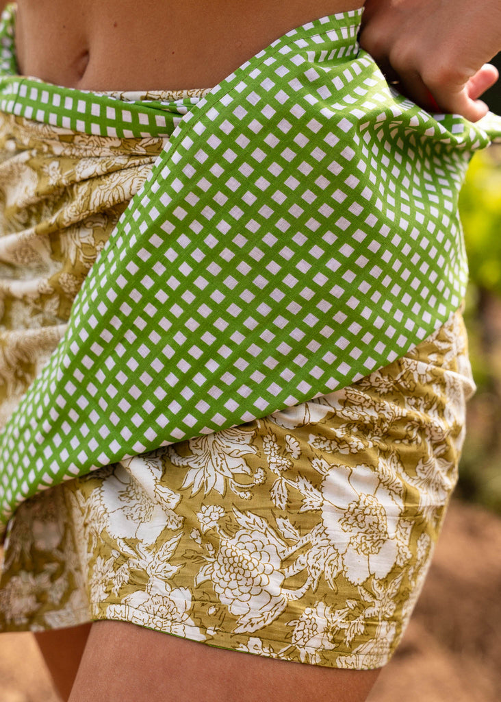 Naia Double-sided Skirt — detail, green & floral prints on model — MYFASHIONFRUIT