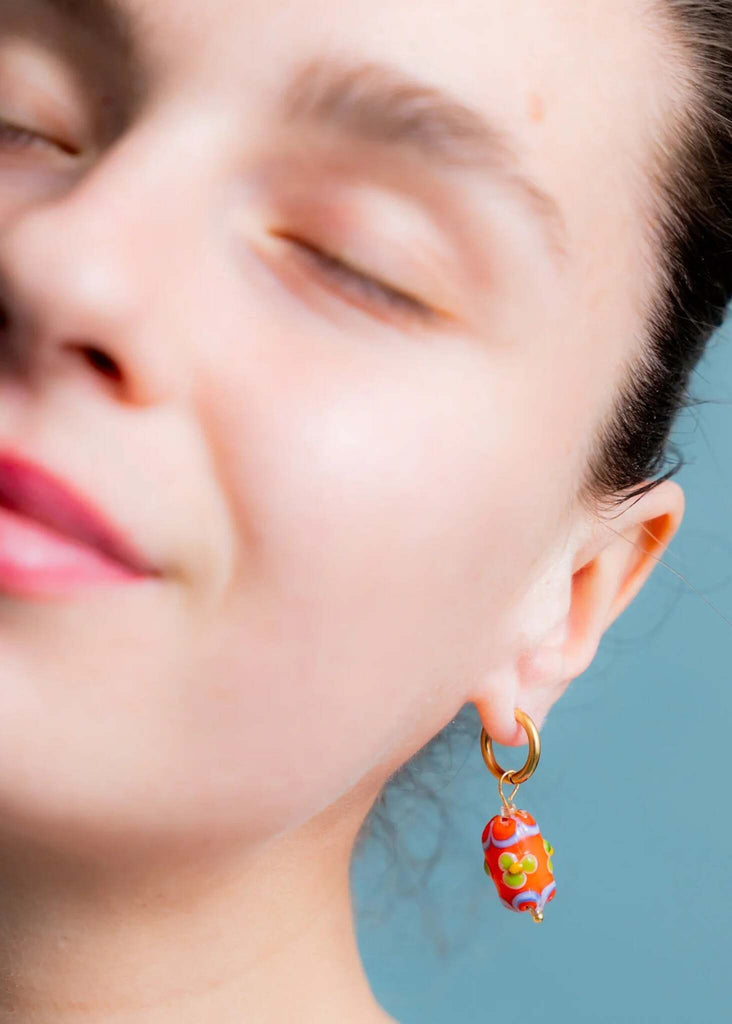 Set of Mood Charms — orange floral bead earring on model — MYFASHIONFRUIT