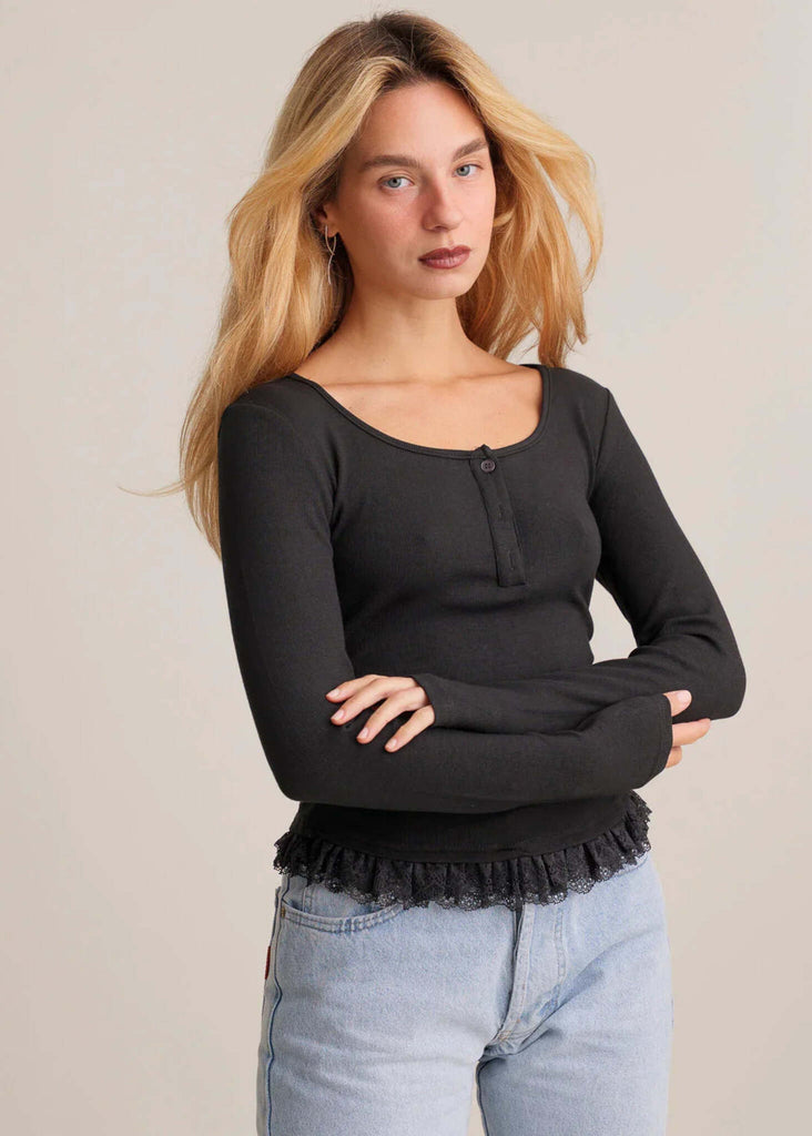 Calvina Top — Black ribbed top with lace trim on model — MYFASHIONFRUIT