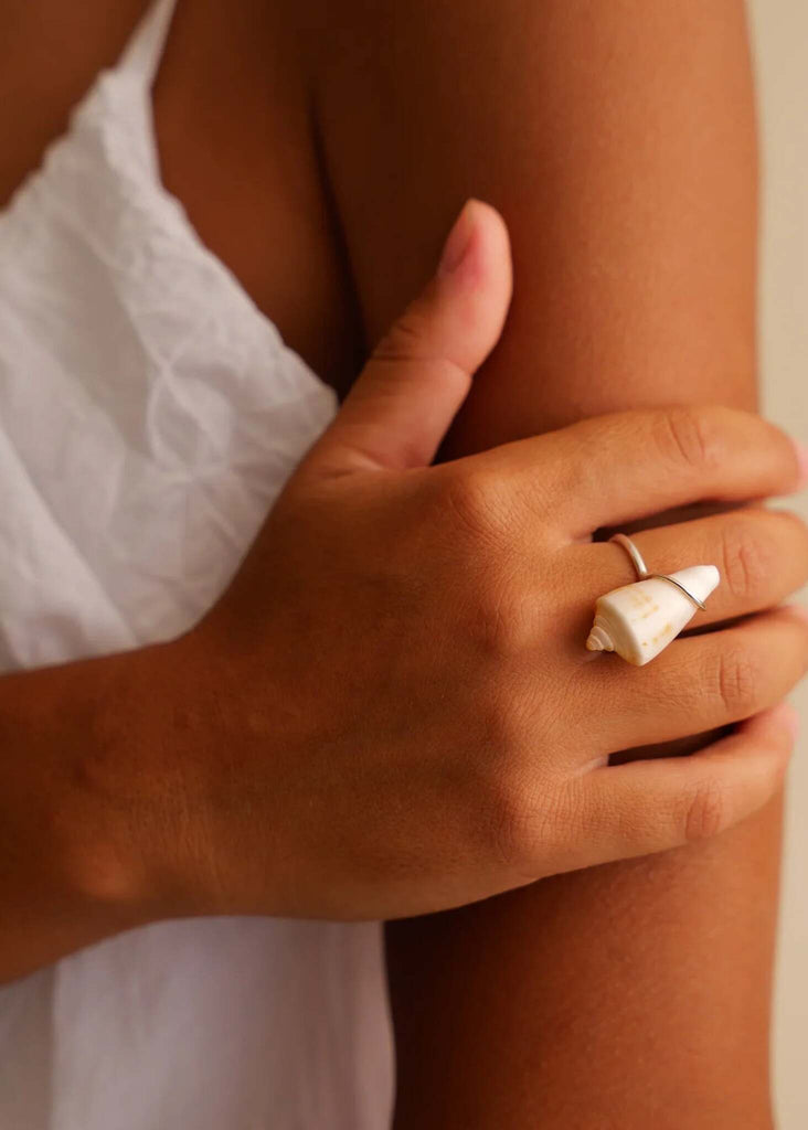 Naiad Ring — Silver ring with a small white seashell detail on model — MYFASHIONFRUIT