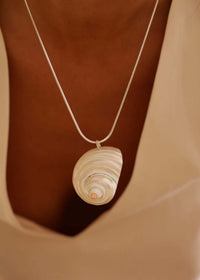 Ianassa Necklace — Shell pendant on silver chain, on model — MYFASHIONFRUIT