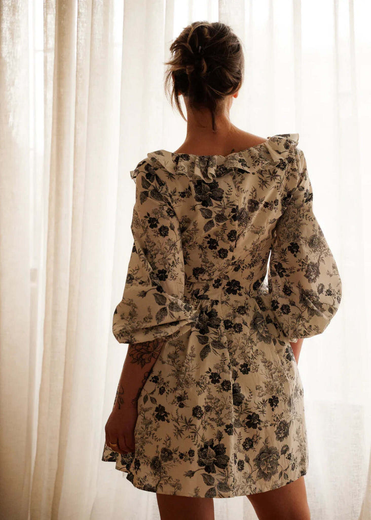 Carmen Dress — Floral print dress on model, back view — MYFASHIONFRUIT