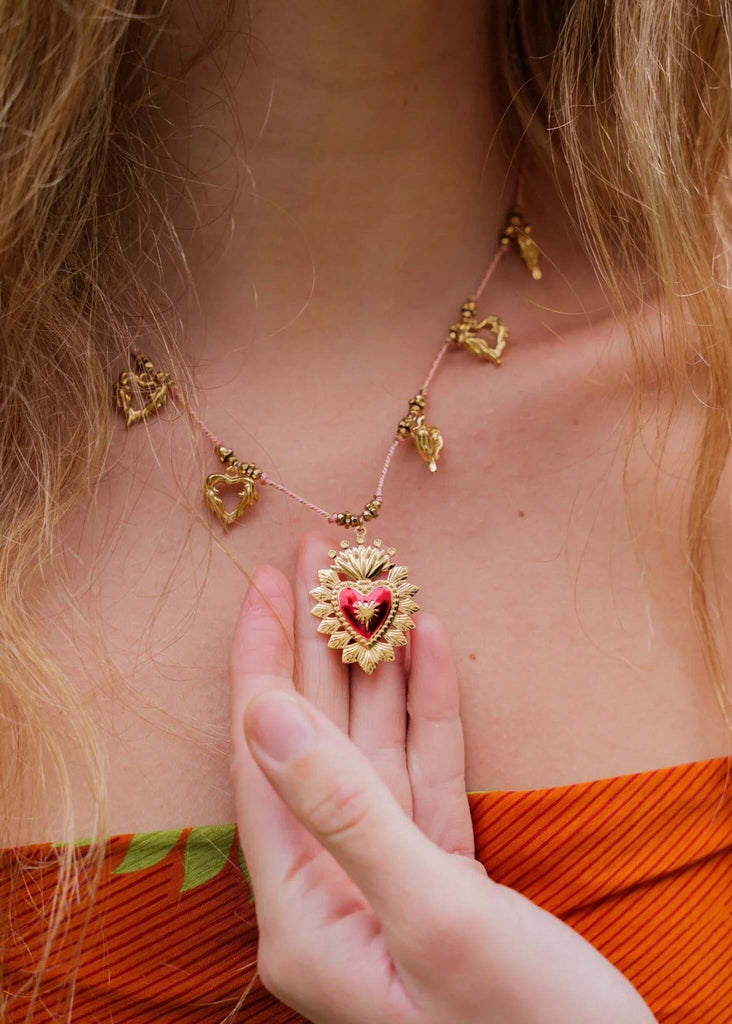 Rousseau Necklace — Detail of heart pendant on model — MYFASHIONFRUIT