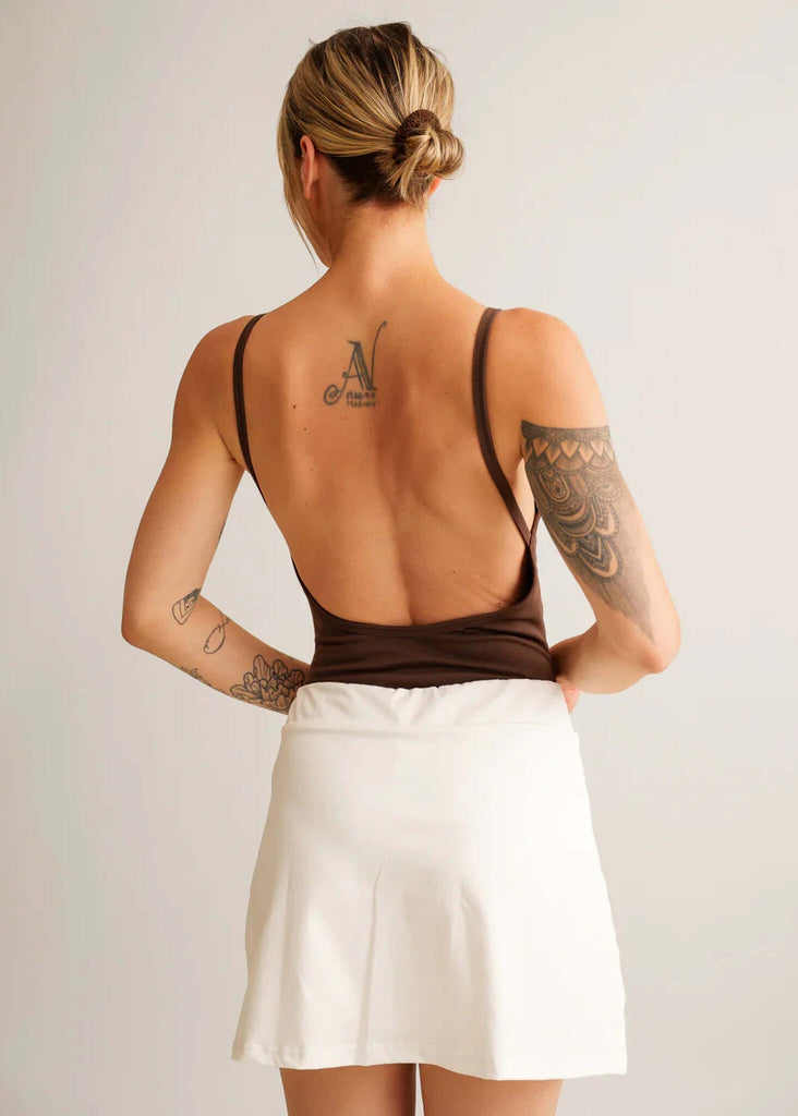 Courtney Body — Brown bodysuit and white skirt on model, back view — MYFASHIONFRUIT