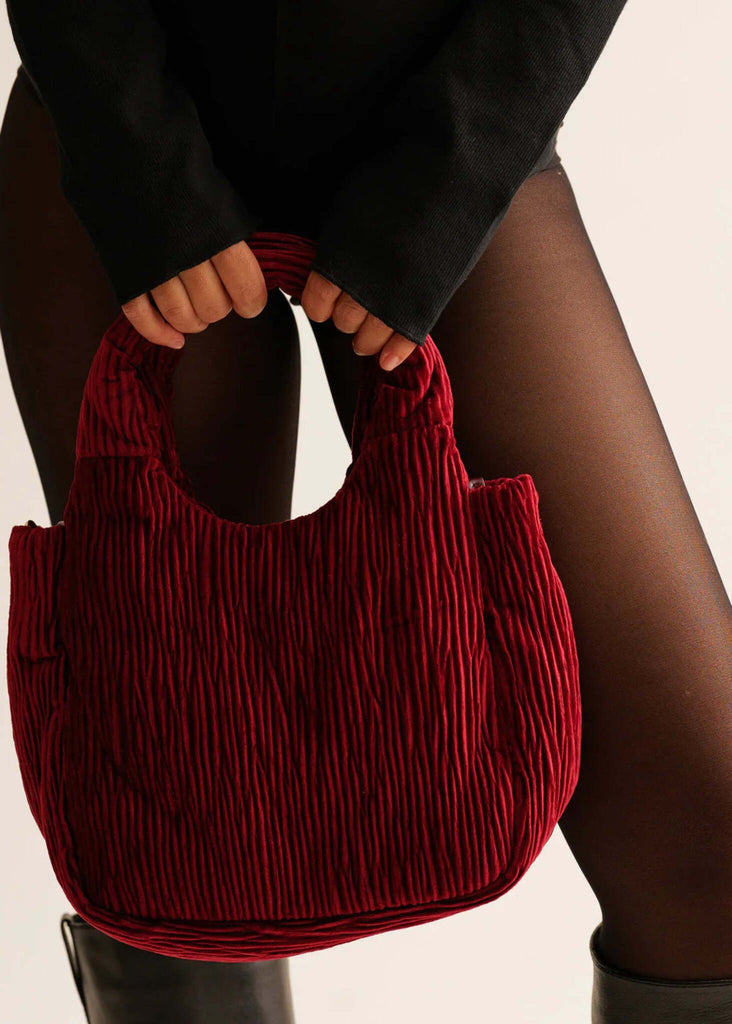 Maryse Bag — Red, ridged velvet bag on model — MYFASHIONFRUIT
