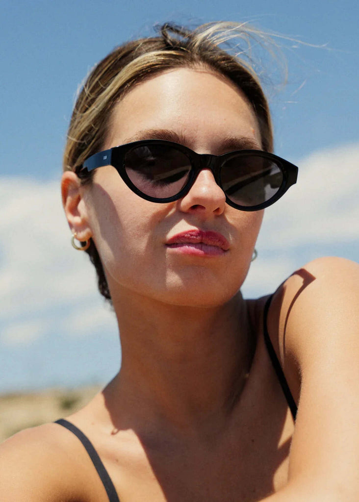 Komono KIKI Black Sunglasses — on model, glossy frame — MYFASHIONFRUIT