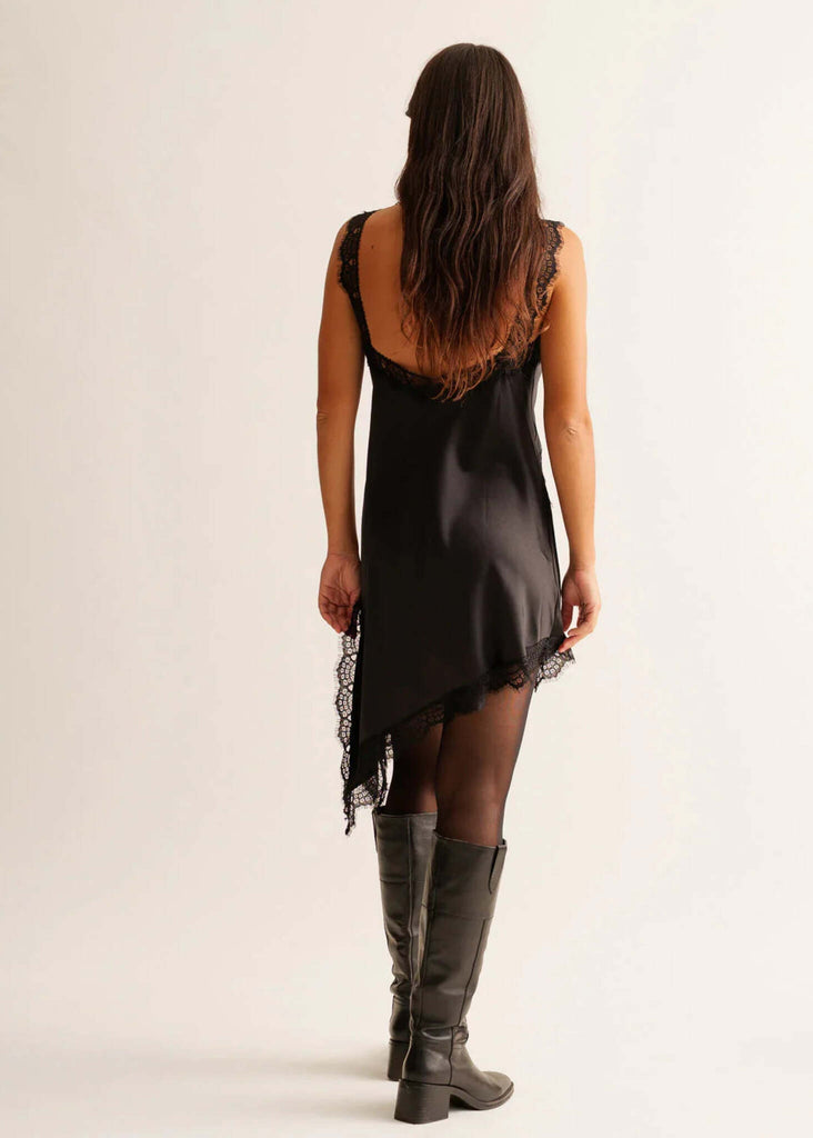 Salome Dress — black lace trim dress on model, back view — MYFASHIONFRUIT