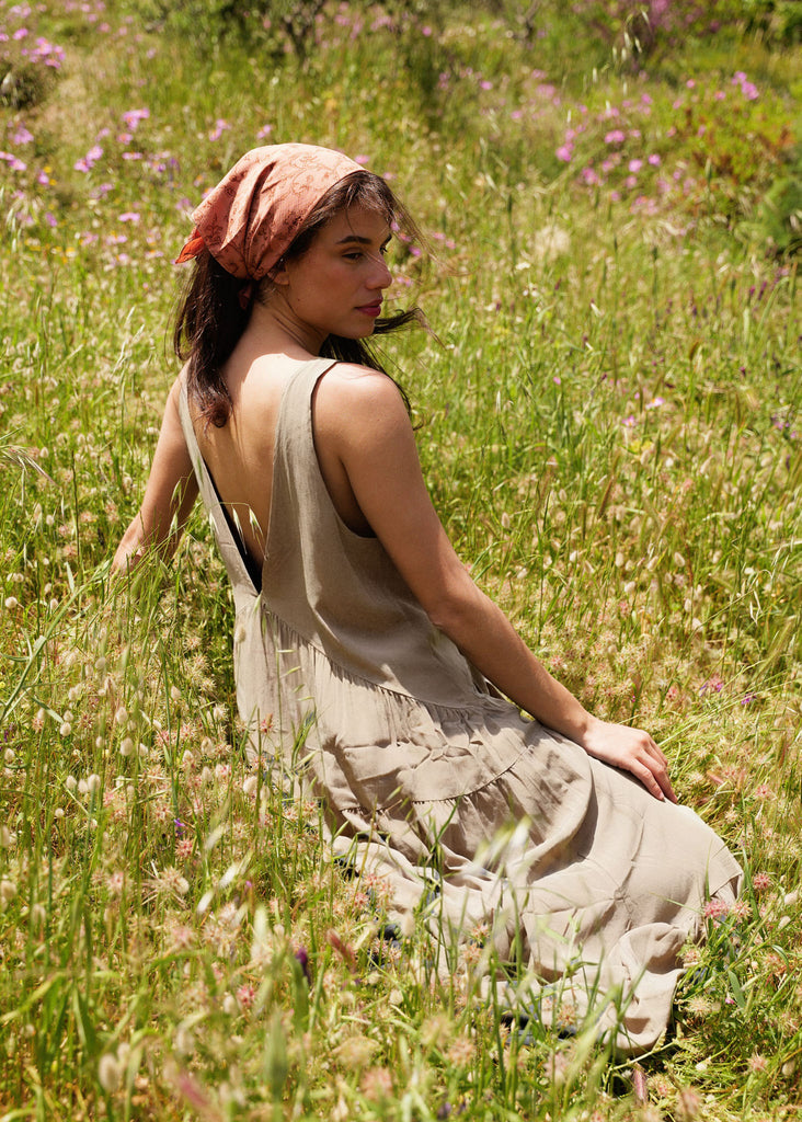 Gaea Dress — Tiered beige dress on model in field — MYFASHIONFRUIT