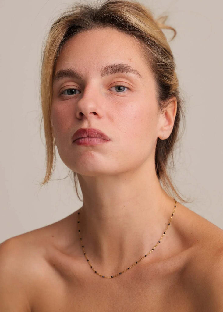 Dakota Necklace — Gold chain necklace with black beads on model — MYFASHIONFRUIT