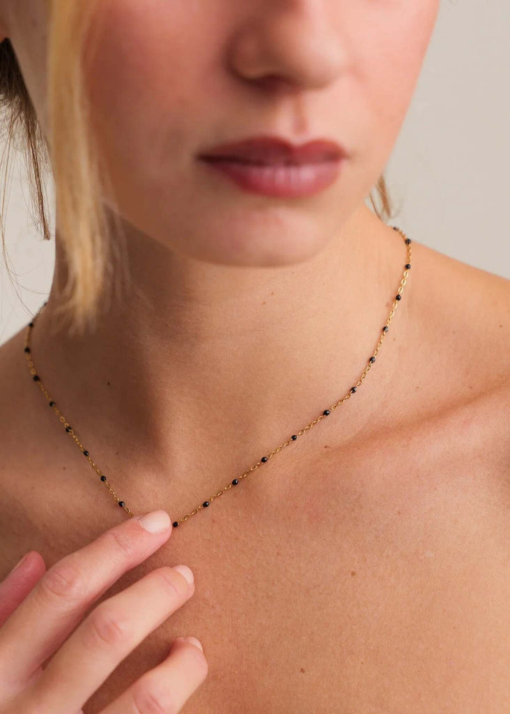Dakota Necklace — Gold chain with black beads on model — MYFASHIONFRUIT