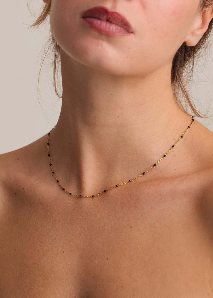 Dakota Necklace — Gold chain necklace with black beads on model — MYFASHIONFRUIT