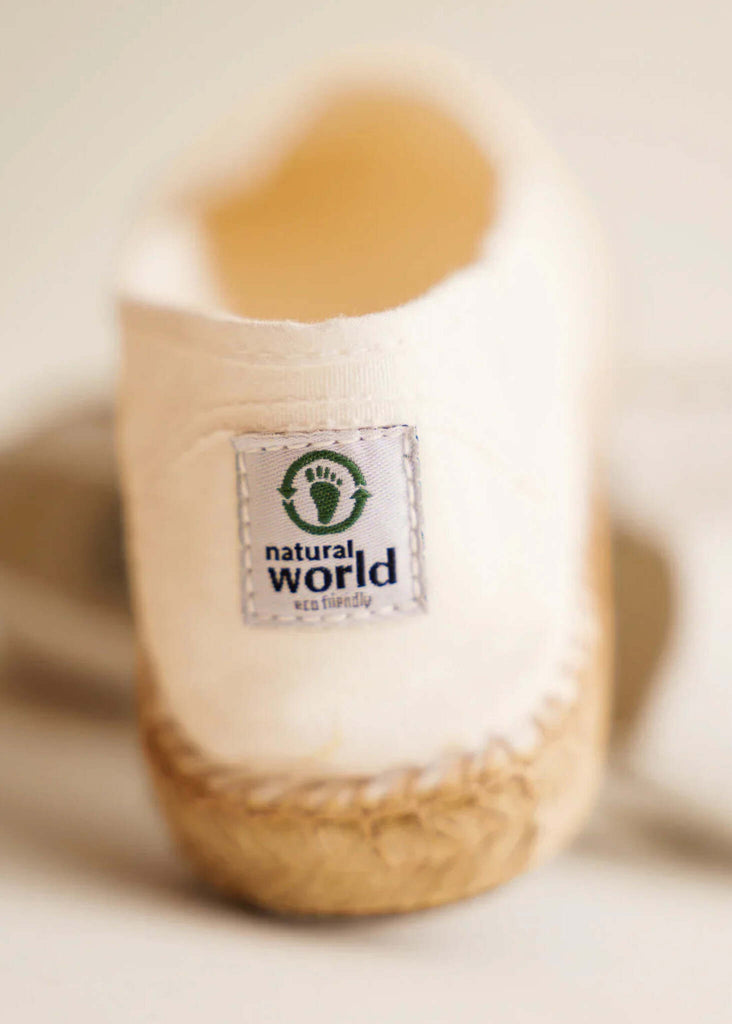 Merle Espadrilles — Detail of ecru shoe with natural world logo — MYFASHIONFRUIT