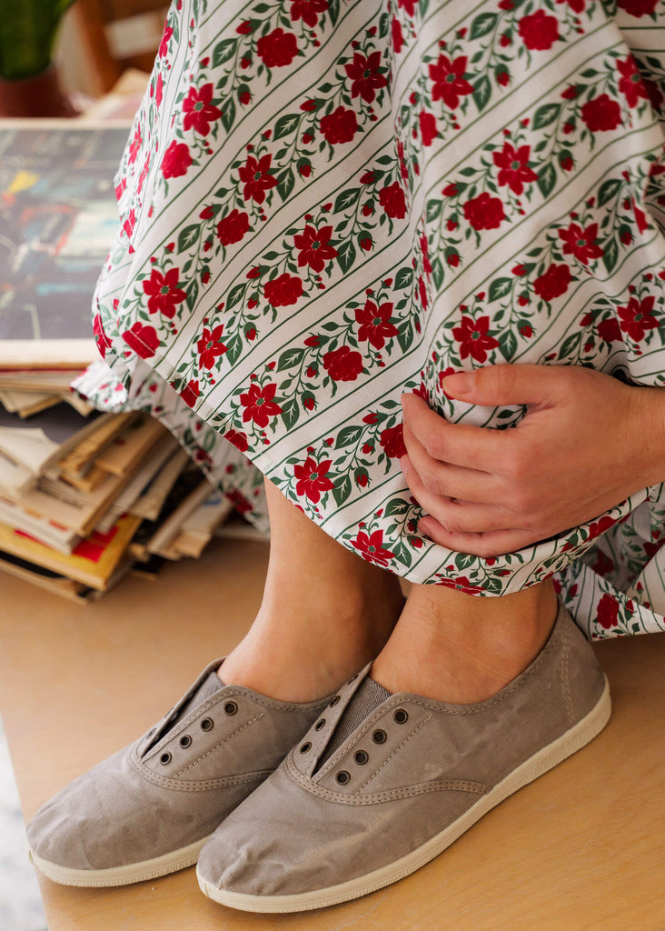 Old Arum Sneakers — Beige canvas shoes on model, dress with floral print — MYFASHIONFRUIT