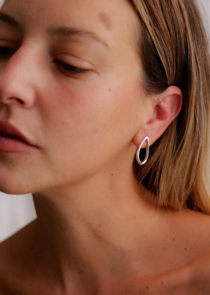 Clementine Earrings — Silver teardrop earrings on model — MYFASHIONFRUIT