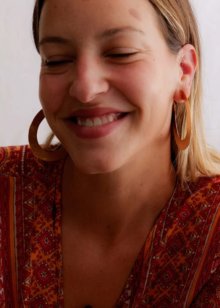 Candra Golden Hoops — Gold oval hoops on model — MYFASHIONFRUIT
