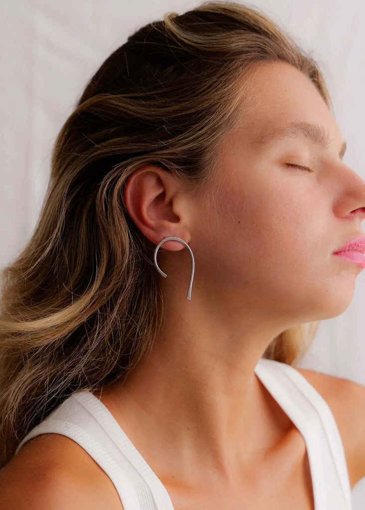 Spicy Silver Earrings — Silver, horseshoe earrings on model — MYFASHIONFRUIT