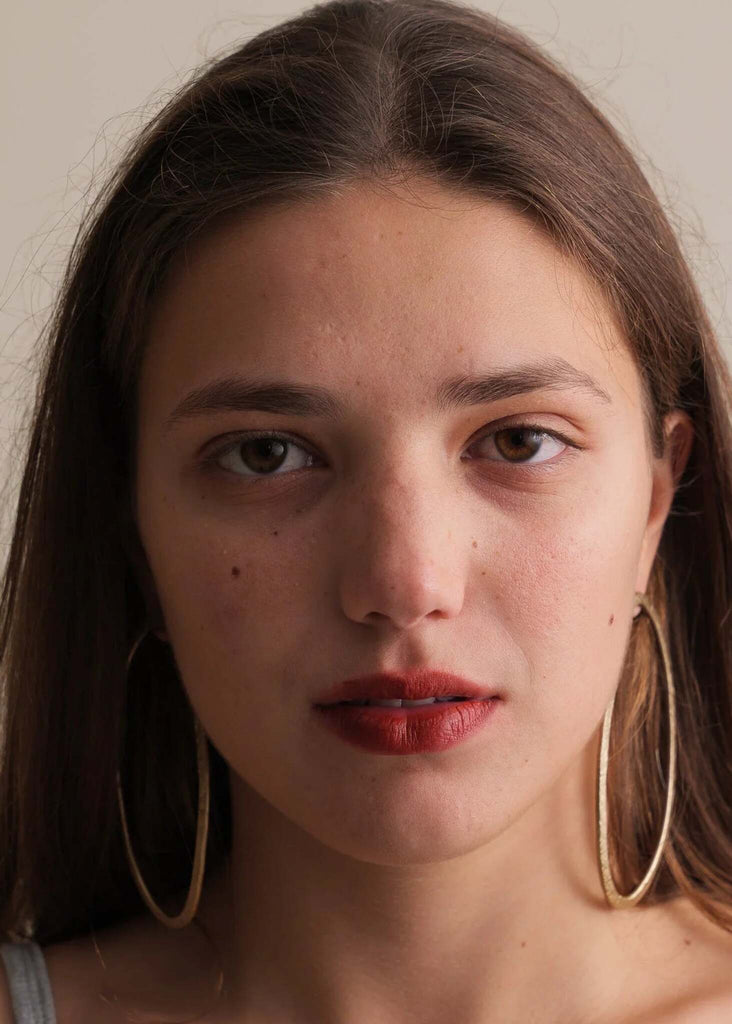 Ivee Earrings — Gold hoops on model — MYFASHIONFRUIT