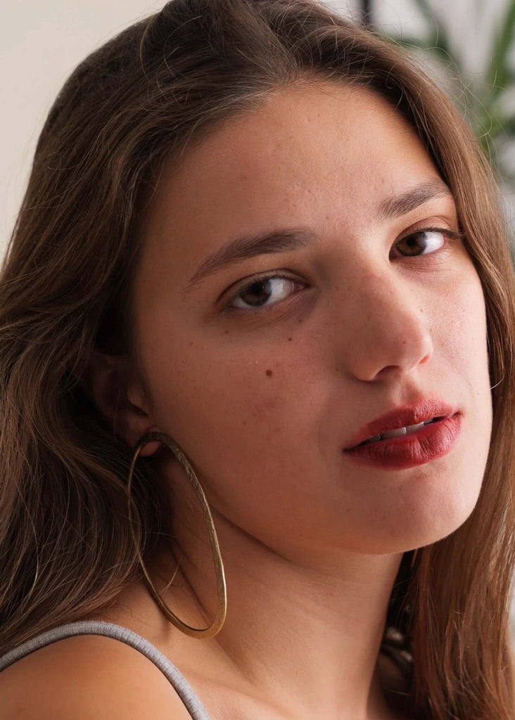 Ivee Earrings — Gold hoop earrings on model — MYFASHIONFRUIT