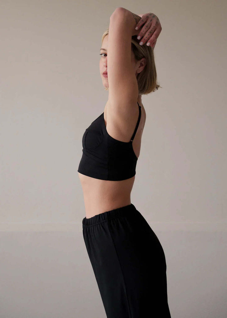 Eden Top — Black top on model, side view — MYFASHIONFRUIT