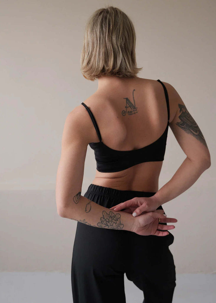 Eden Top — Black top on model from the back — MYFASHIONFRUIT