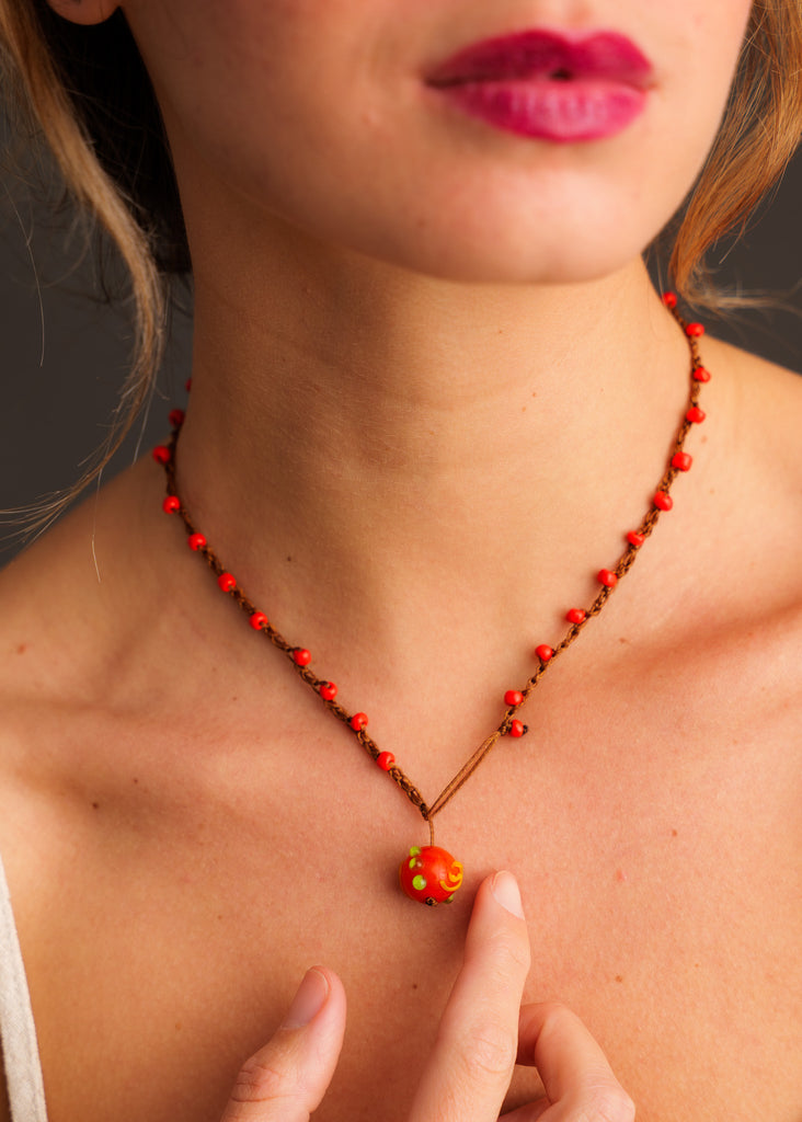Nirvana Necklet — Detail of red beaded necklace on model — MYFASHIONFRUIT