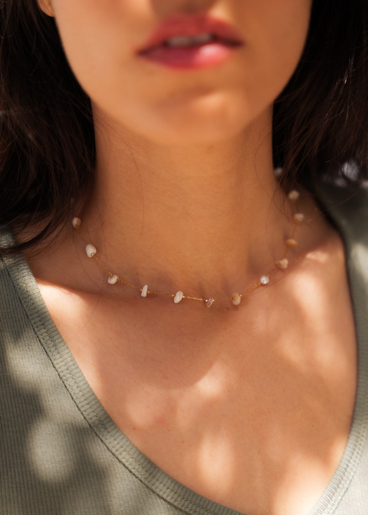 Morissa Necklace — Gold chain with white stones on model — MYFASHIONFRUIT