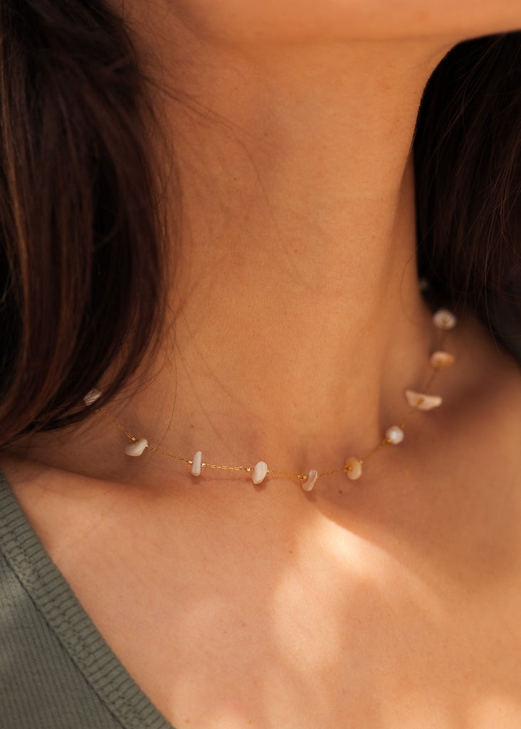 Morissa Necklace — Gold chain with shells on model — MYFASHIONFRUIT