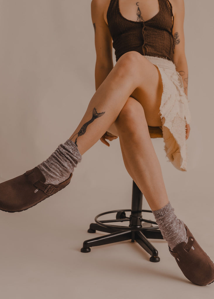 Bilbao Suede Clogs — Brown suede clogs, grey socks, on model — MYFASHIONFRUIT