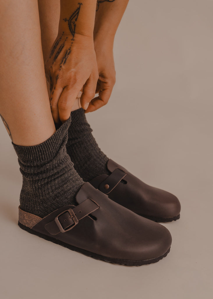 Bilbao Leather Clogs — Dark brown leather clogs and gray socks on model — MYFASHIONFRUIT