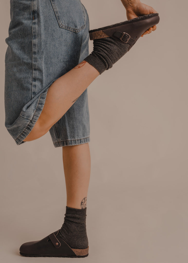 Bilbao Leather Clogs — Black leather clogs with buckle detail on model — MYFASHIONFRUIT