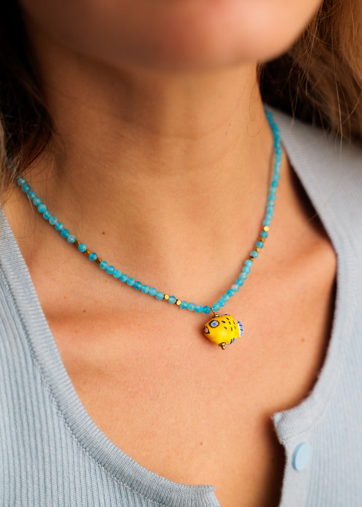 Asherah Necklace — on model, blue beads, yellow fish — MYFASHIONFRUIT