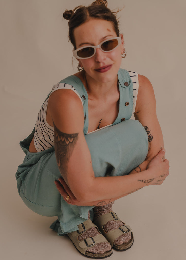 Palma Suede Sandals — Model wearing sandals, squatting — MYFASHIONFRUIT