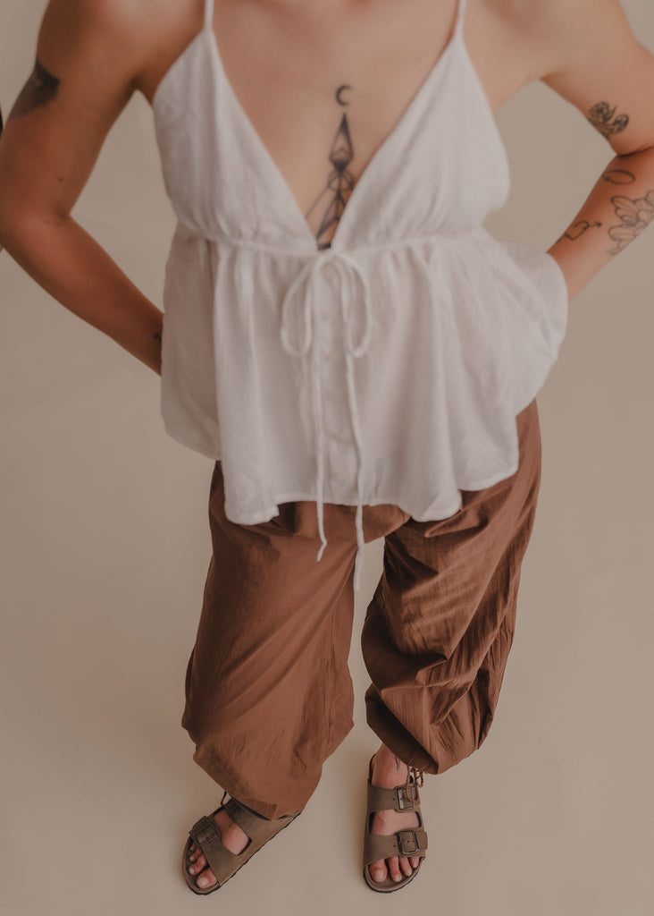 Palma Suede Sandals — Model wearing brown sandals and pants with white top — MYFASHIONFRUIT