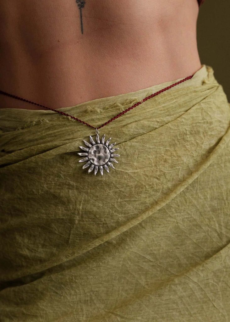 Anatoly Pendant — Silver sun detail on model — MYFASHIONFRUIT