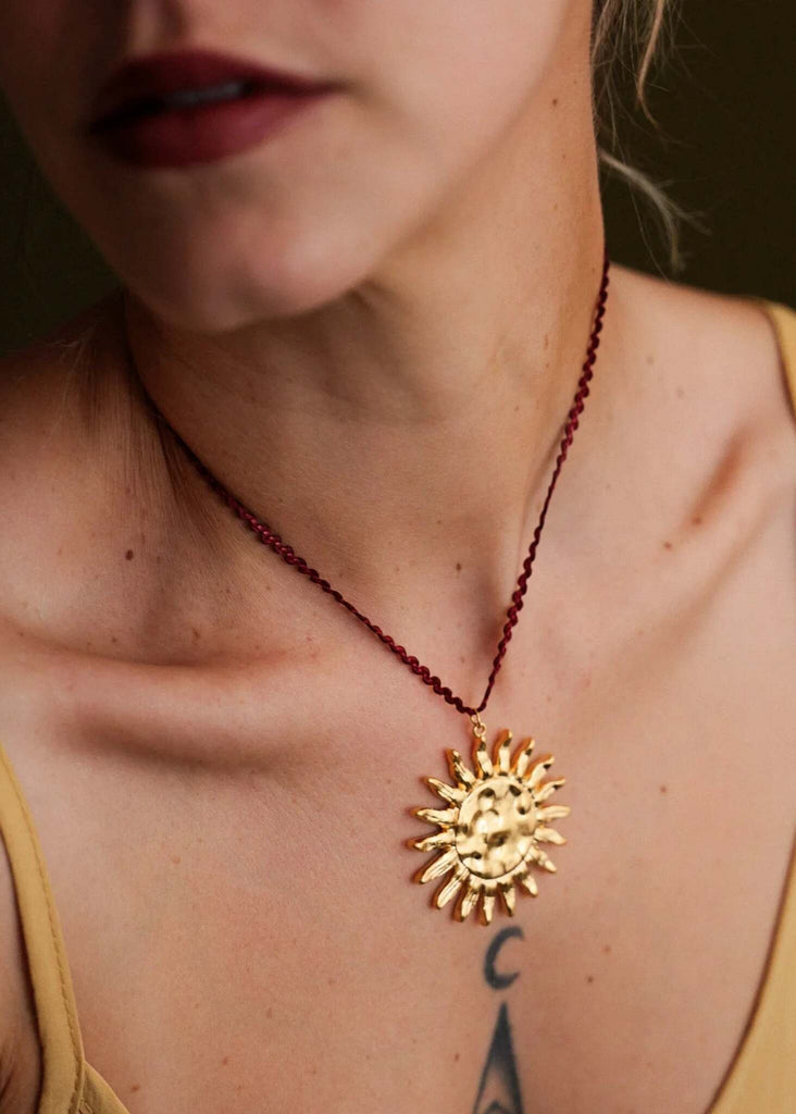 Anatoly Pendant — Gold sun pendant on model — MYFASHIONFRUIT